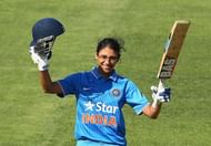 HOBART, AUSTRALIA - FEBRUARY 05:  Smriti Mandhana of India celebrates after reaching her century during game two of the women's one day international series between Australia and India at Blundstone Arena on February 5, 2016 in Hobart, Australia.  (Photo by Robert Cianflone/Getty Images)